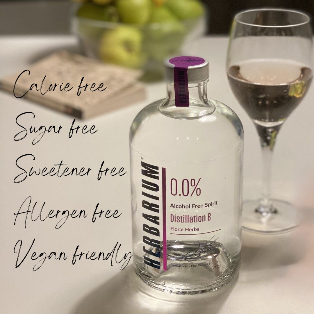 alcohol free drink herbarium distillation 8 bottle with a glass in a casual setting